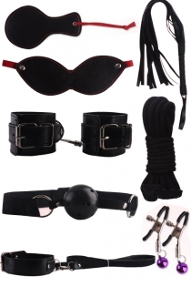 Black BDSM Props Including Mask, Ball Gag, Restraints, Nipple Clamps, and Whip