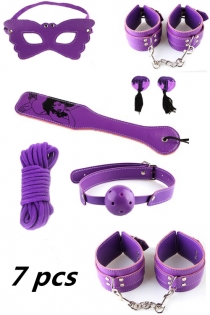 Purple BDSM Props Including Mask, Paddle, Handcuffs, Gag, Ropes, and Tickler